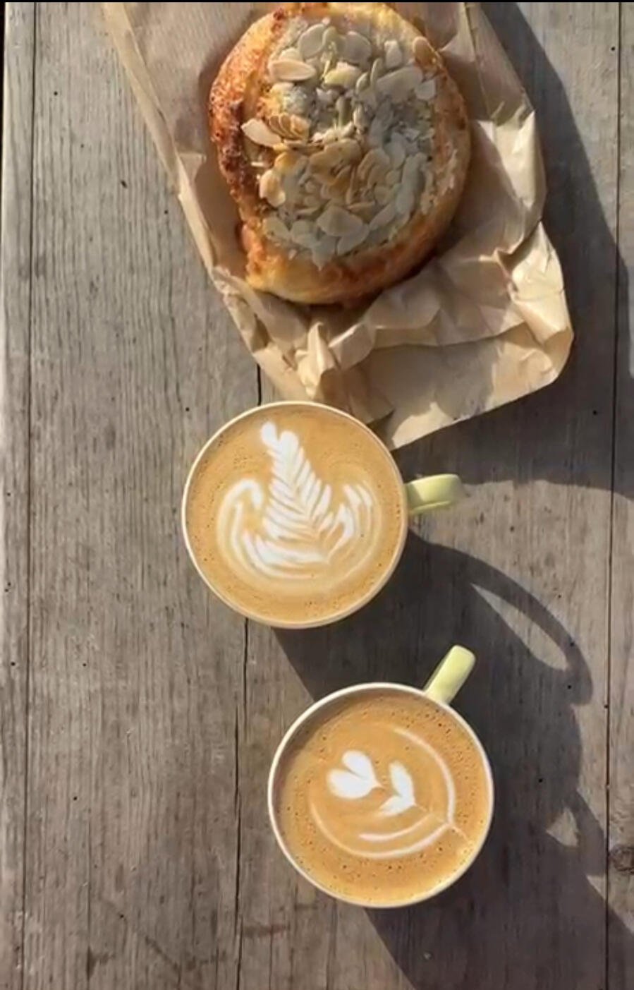 Specialty coffee and almond croissant