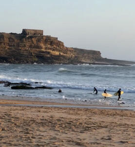 surfers at ribeira de ilhas