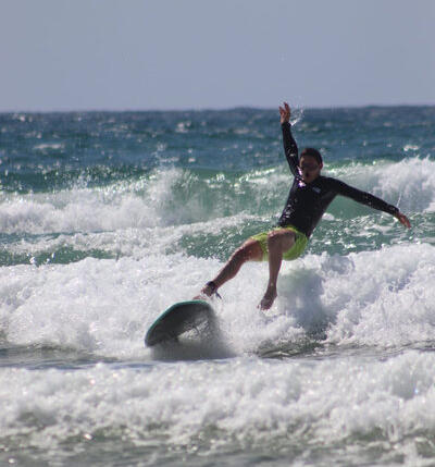 beginner falling on wave
