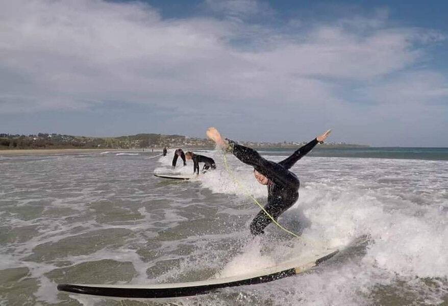 whitewater surfer falling